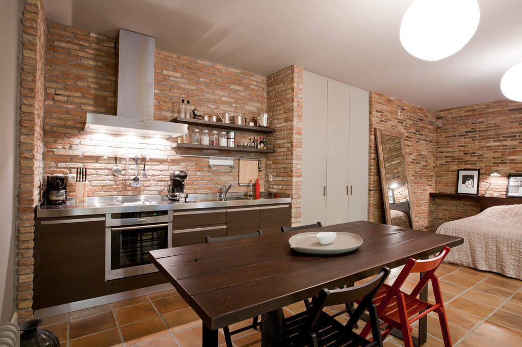 Kitchen factory design with brick walls by Alexia, architect on Design for Me