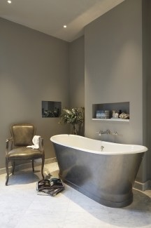 Freestanding bath in lovely grey bathroom by Laura, interior designer